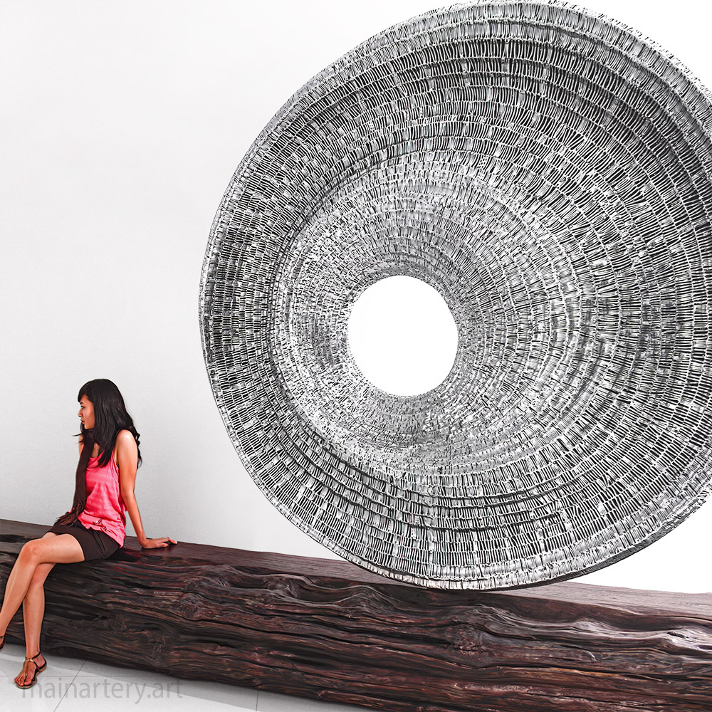 Cover: Black Hole Stainless Steel Sculptures