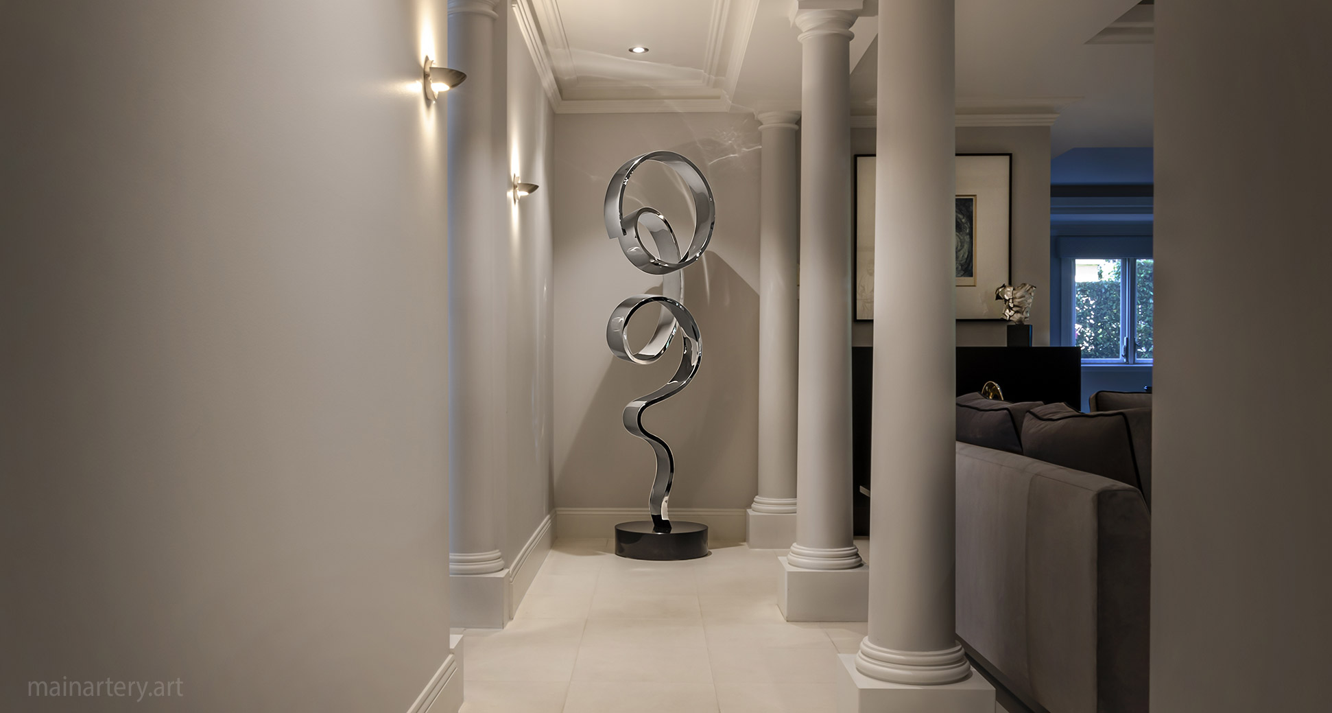 large polished stainless steel ribbon sculpture image