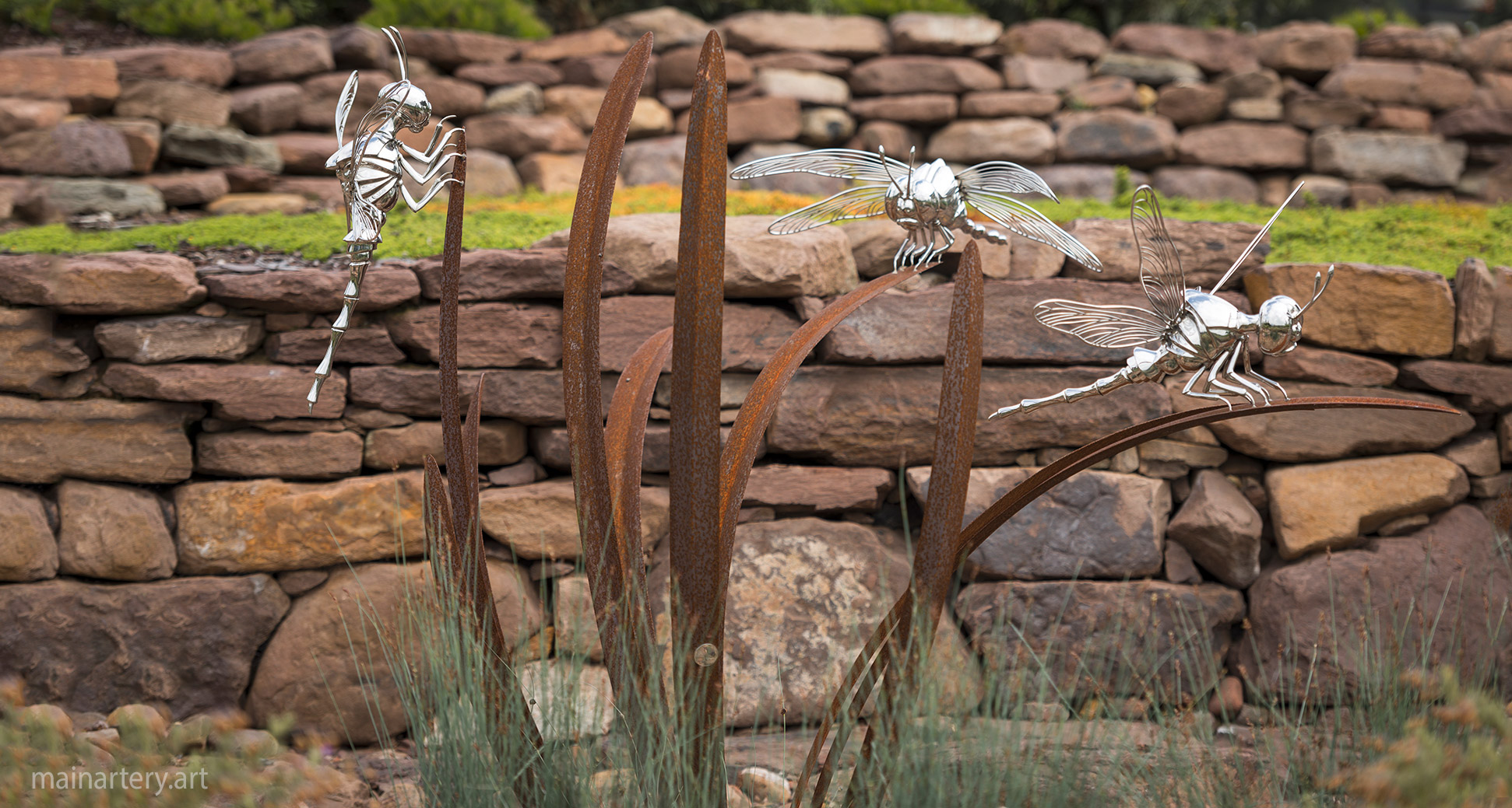 large stainless steel representational dragonfly garden sculpture image