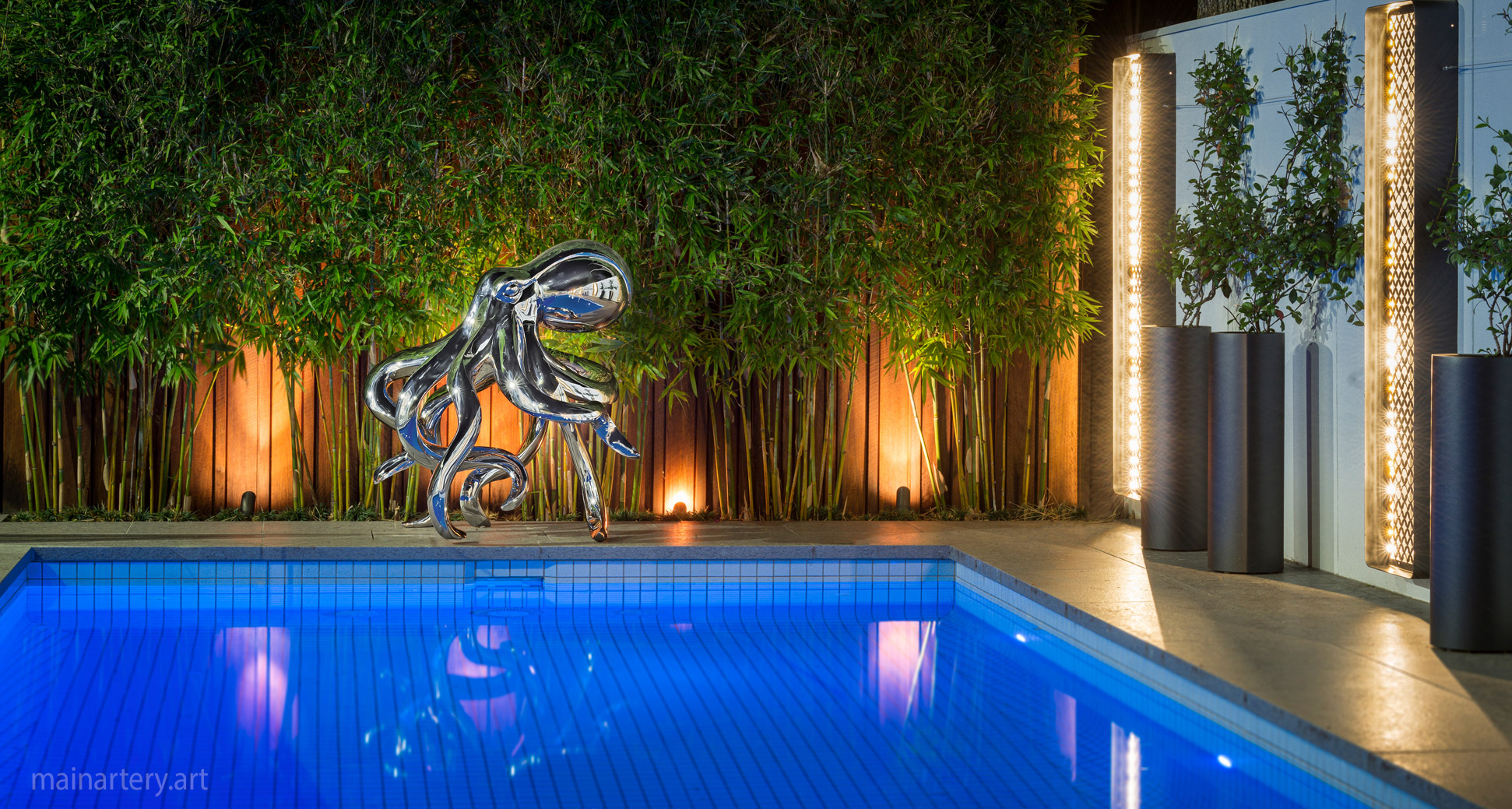 freestanding open spaces stainless octopus art image