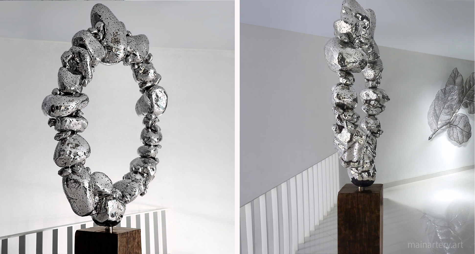 large indoor balancing pebbles stainless sculpture art image