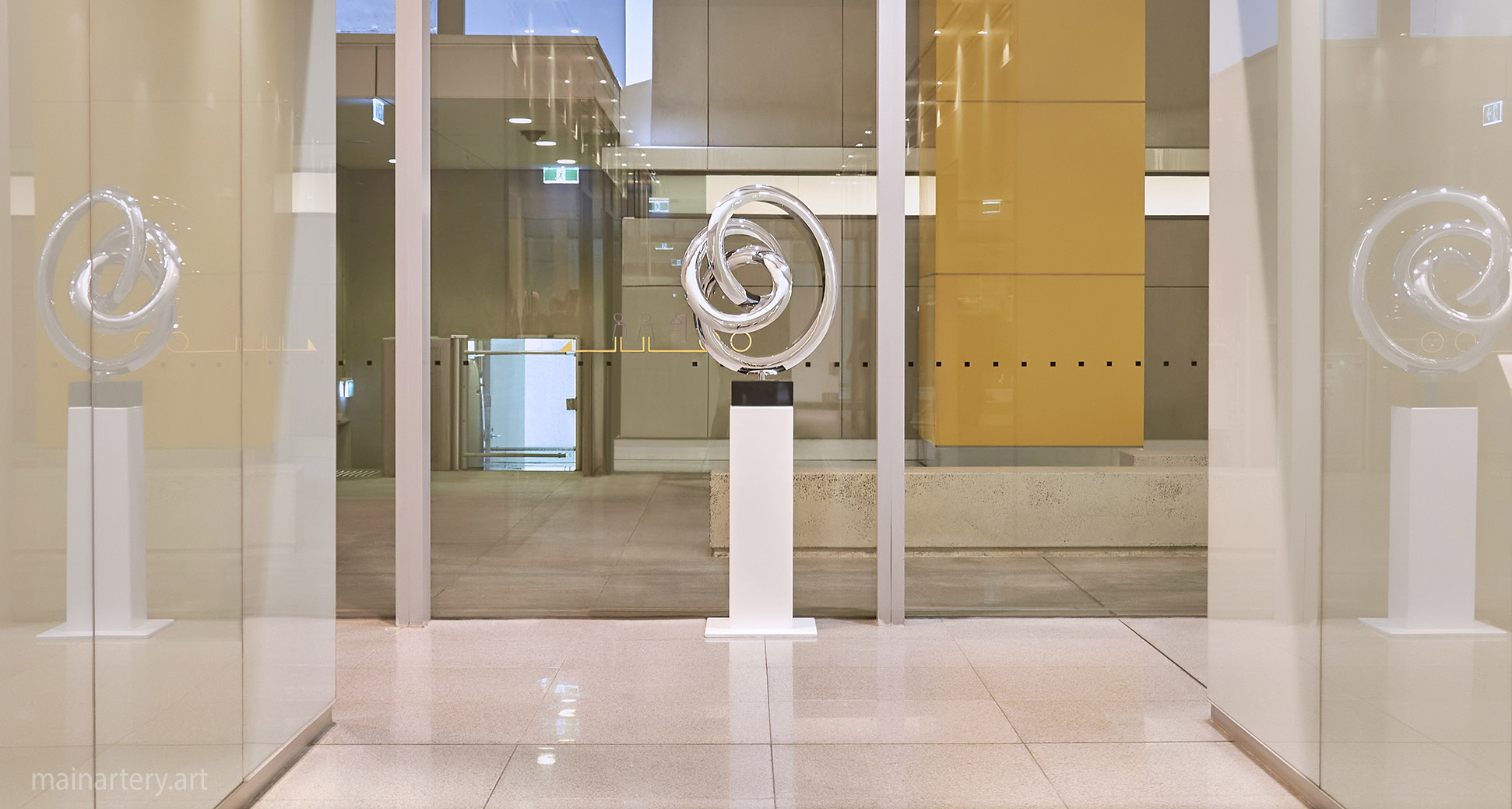 modern spherical sculpture rental commercial lobby image