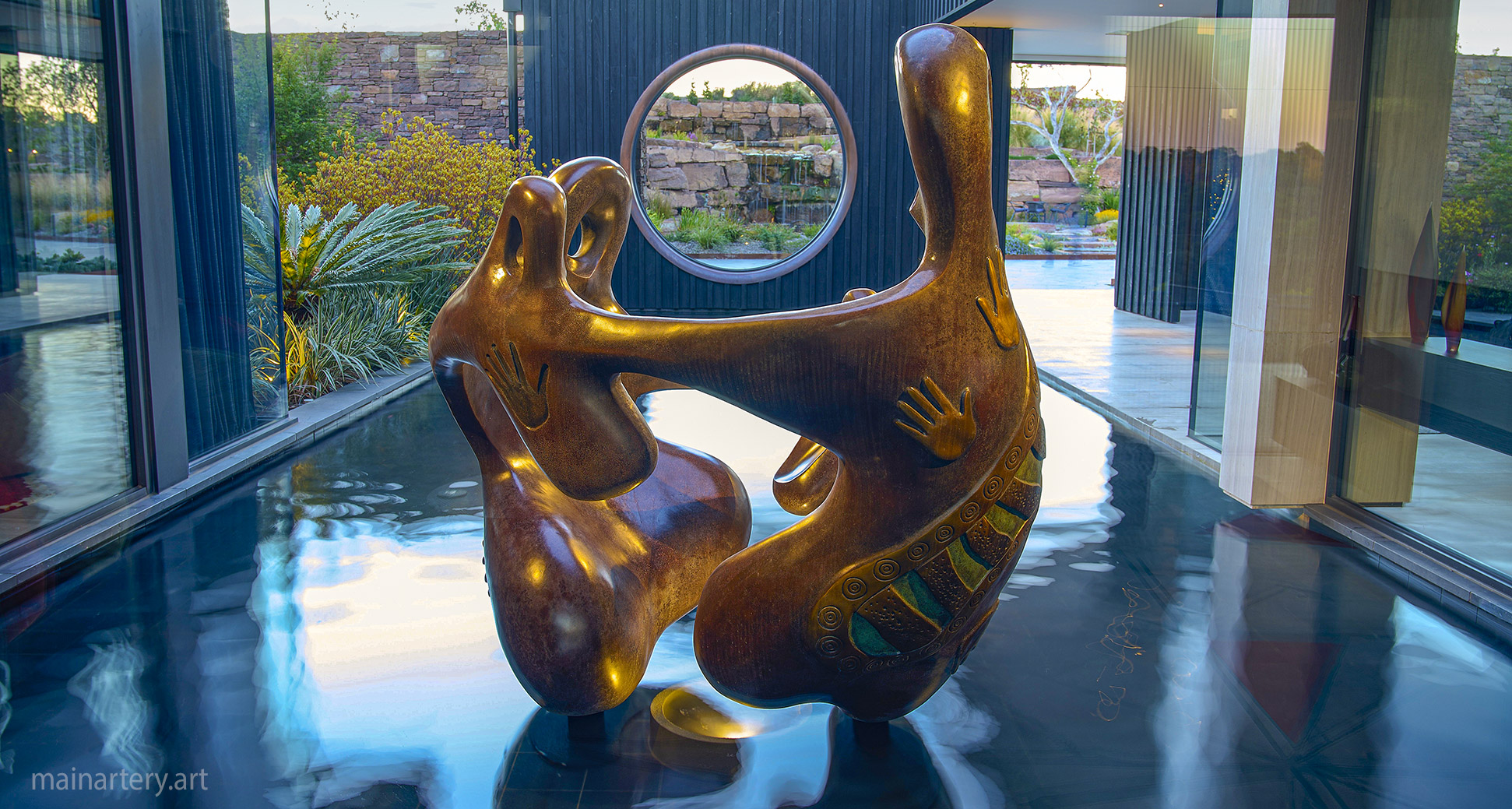 Giant Multi-Patina Organic Outdoor Aboriginal Family Unity Sculpture, symbolizing harmony and togetherness