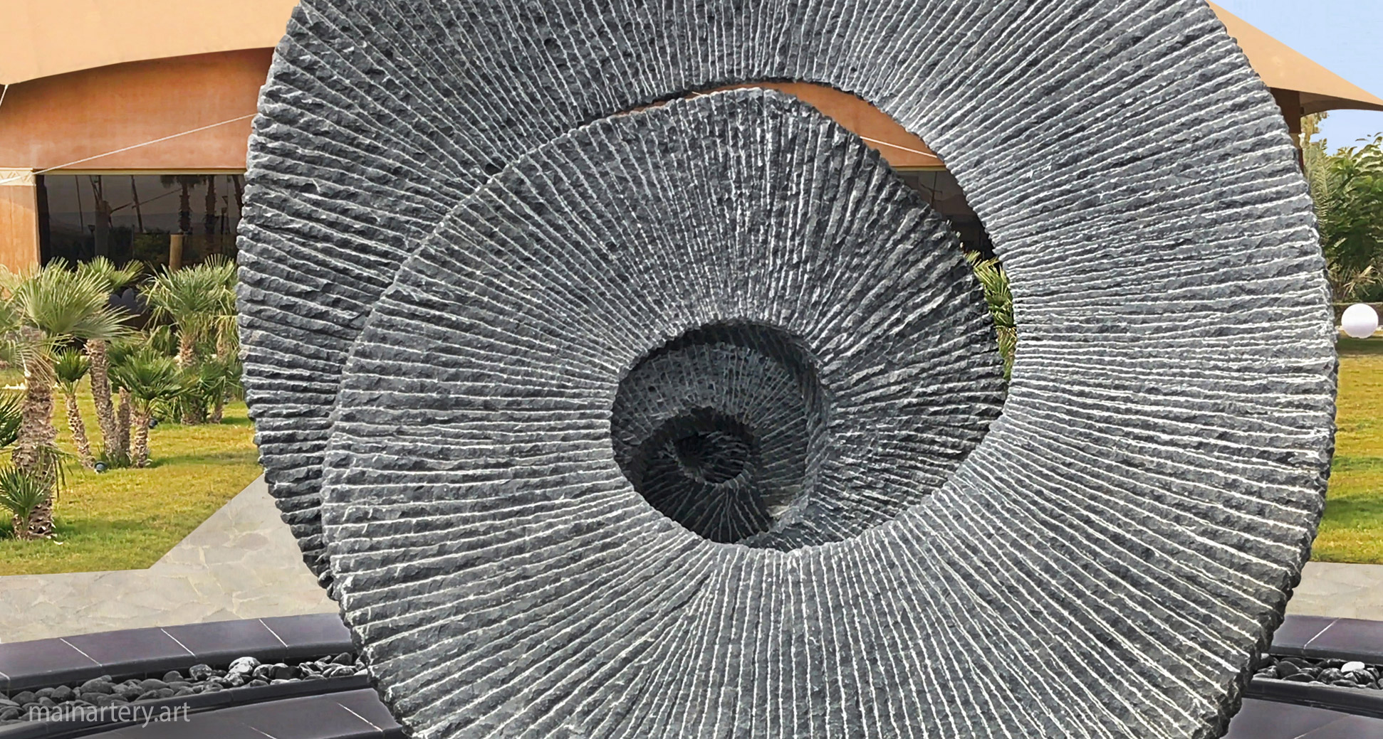 giant stone spherical hand carved sculpture image